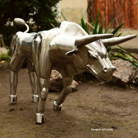 Running bull - metal sculpture